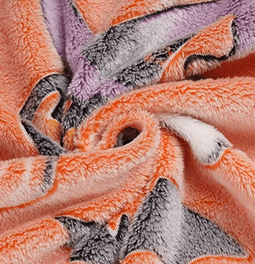 Close-up of sherpa fleece edge on glow-in-the-dark Halloween blanket