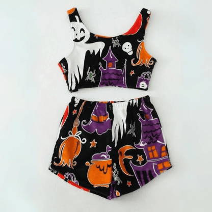Flat lay of black and purple Halloween sherpa pajama set with pumpkin and ghost prints