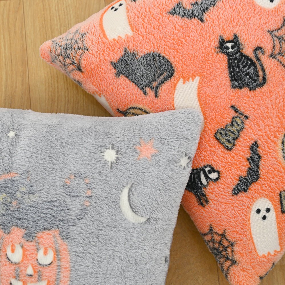 Close-up of halloween glow in the dark plush fleece pillow 