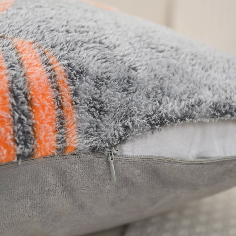 Close-up of plush fleece pillow with hidden zipper closure and sherpa texture
